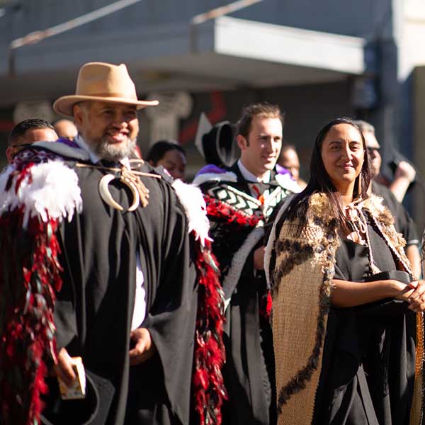 Students wearing kākahu at their graduation ceremony