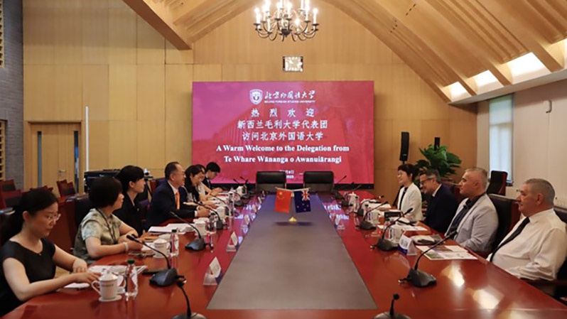 boardroom in China to sign agreement