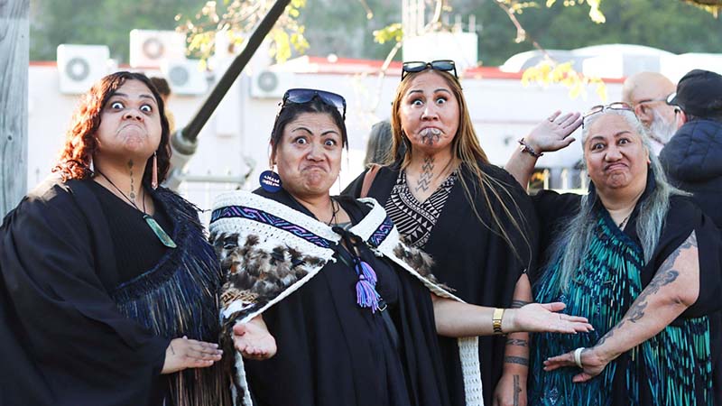 Grads pose before Awanuiārangi hīkoi